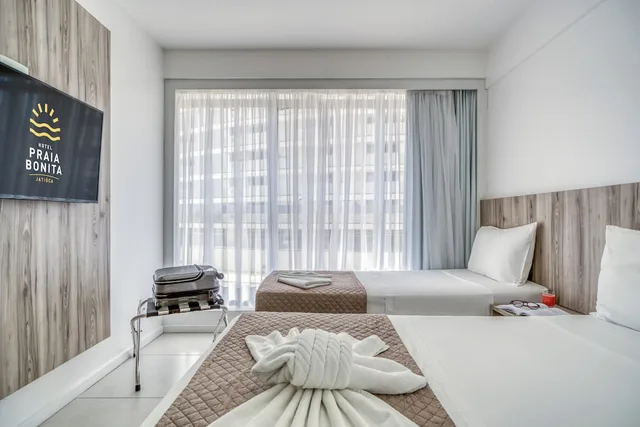 غرفة بريميوم بسرير مزدوج وسرير فردي بإطلالة على المدينة، Hotel Praia Bonita Jatiuca 5/10