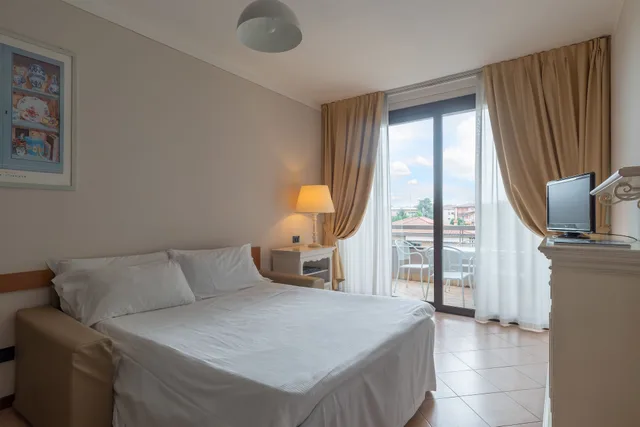شقة بسرير كينج بإطلالة على الحديقة بغرفة نوم واحدة مع أريكة، Residence Il Sogno 1/5
