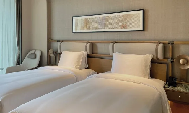 غرفة ديلوكس بسريرين منفصلين بإطلالة على الحديقة، Ocean Spring Resort Chengdu - MGallery Collection 2/3
