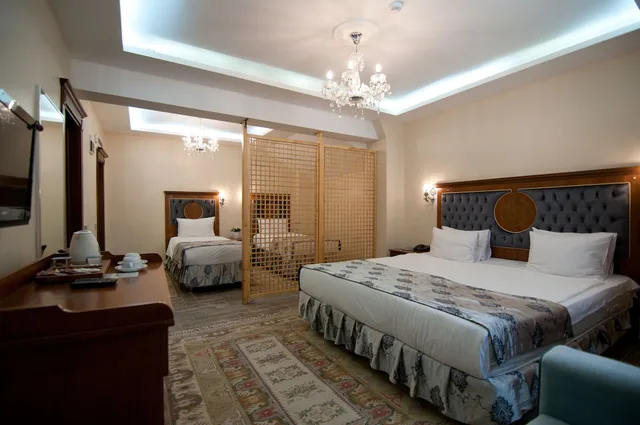 غرفة اقتصادية رباعية بسريرين منفصلين وسرير كينج مع أريكة في الطابق الأرضي، Ala Sofia Hotel 3/10