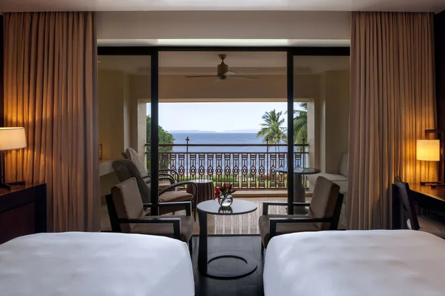 غرفة بسريرين منفصلين بإطلالة على الحديقة بشرفة، GRAND HYATT GOA 8/10