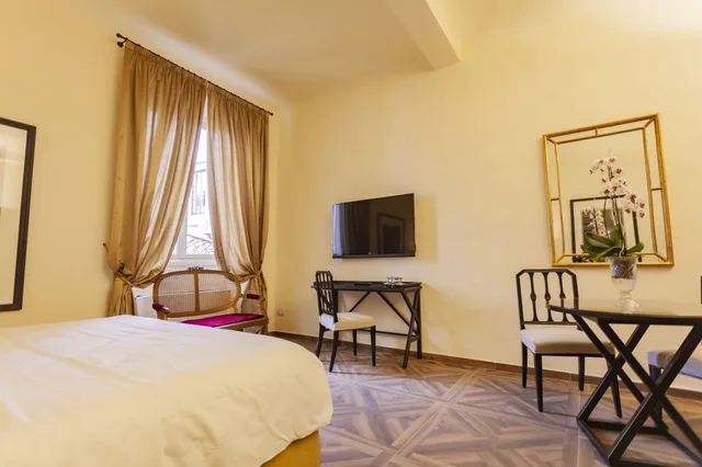 غرفة ديلوكس بسرير كينج مع أريكة، Palazzo Martellini Residenza D'epoca 1/2