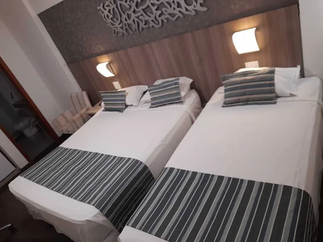 غرفة ديلوكس ثلاثية بسرير كوين وسرير فردي، Allia Gran Hotel Pampulha Suites 7/10