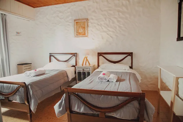 غرفة بسريرين منفصلين بحمام مشترك، Schilling Hostel Patagonico 2/2