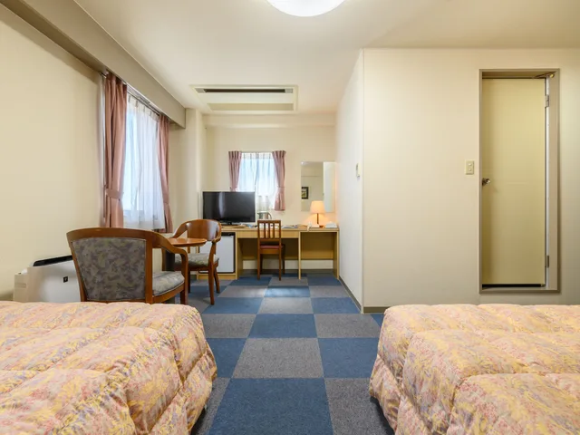 غرفة ثلاثية بسريرين منفصلين مع سرير سحّاب إضافي، Tabist Inuyama Miyako Hotel 4/6