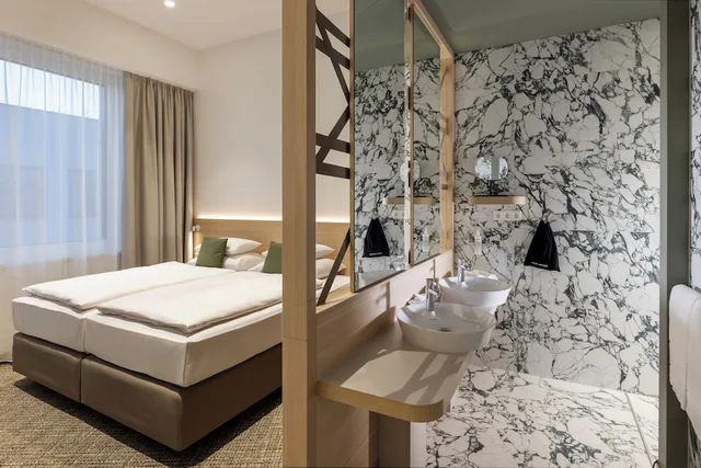 جناح بزنس بسرير كينج مع أريكة، Arcotel Aq Wien 1/4