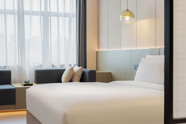 جناح بسرير كوين بإطلالة على المدينة، Rezen Longuu Hotel (Guangzhou Baiyun Airport Cultural Tourism City) 4/6