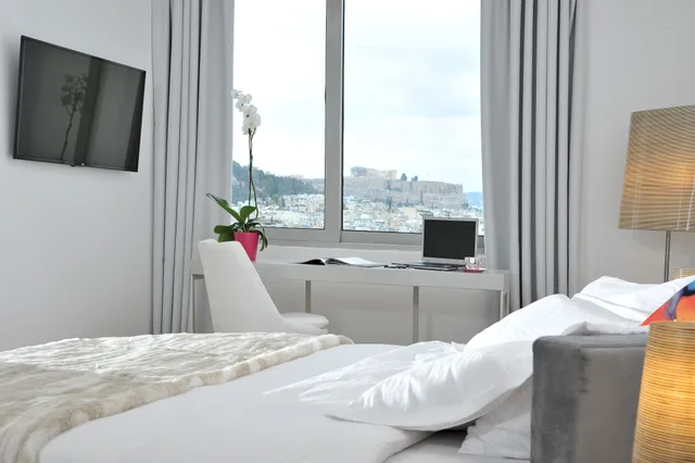 غرفة ديلوكس بسرير مزدوج أو سريرين منفصلين بإطلالة، Athenaeum Grand Hotel 1/3
