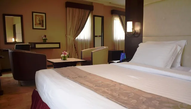 غرفة ديلوكس بسرير كينج، Manhattan Avenue Hotel 5/6