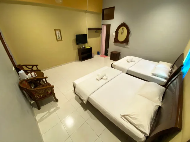 غرفة عائلية، Sabak Awor Resort by ZUZU 2/5