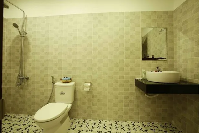 غرفة ديلوكس بسريرين منفصلين، Coconut Garden Homestay Hoi An 2/2
