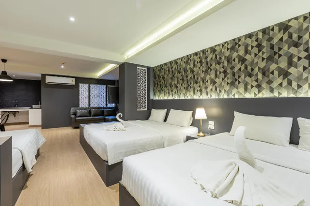 جناح ديلوكس عائلي بسريرين منفصلين وسريرين كينج، Siam Star Hotel 1/2