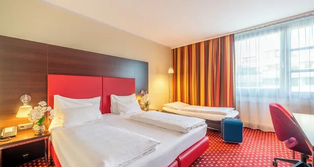 غرفة كومفورت ثلاثية بسرير مزدوج، PLAZA INN Wels 2/7