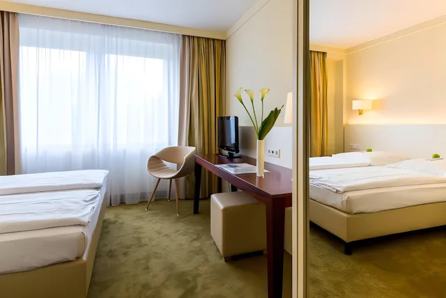 غرفة بسرير مزدوج أو سريرين منفصلين، relexa hotel Stuttgarter Hof 2/2