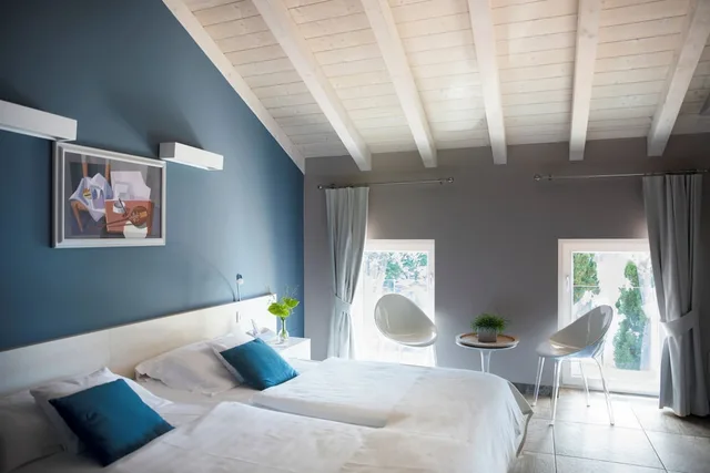 غرفة بريميوم بسرير كينج بإطلالة على البحيرة، Relais Villa Porta 2/10