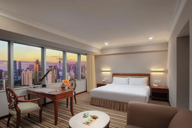غرفة ديلوكس بسرير كينج بإطلالة على المدينة، Jin Jiang Tower Hotel 6/9