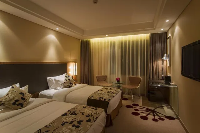 غرفة بسريرين منفصلين بإطلالة على الحديقة، Fliport Garden Hotel Fuzhou 3/4