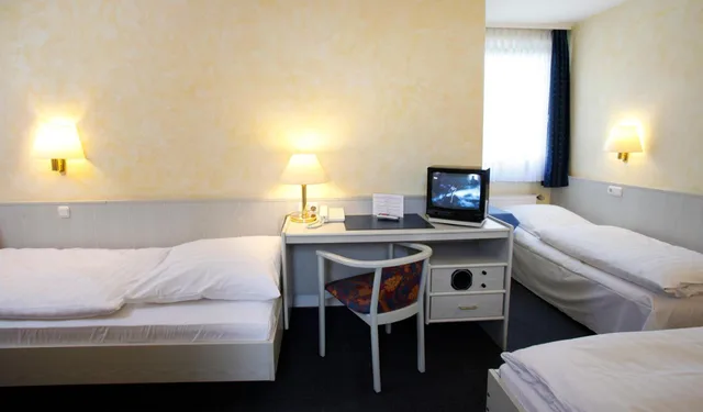 غرفة ثلاثية بسرير فردي، Hotel Rennschuh 2/8