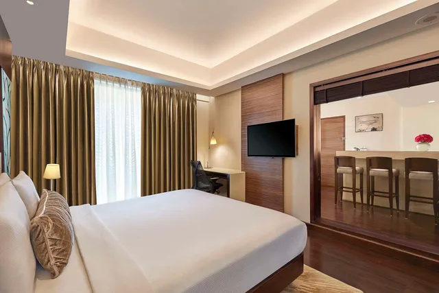 جناح بريميوم بسرير كينج بغرفة نوم واحدة، DoubleTree by Hilton Gurugram Baani Square 1/4