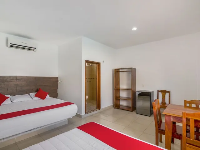 غرفة قياسية بسريرين كوين، OYO Hotel Palma Real 1/4
