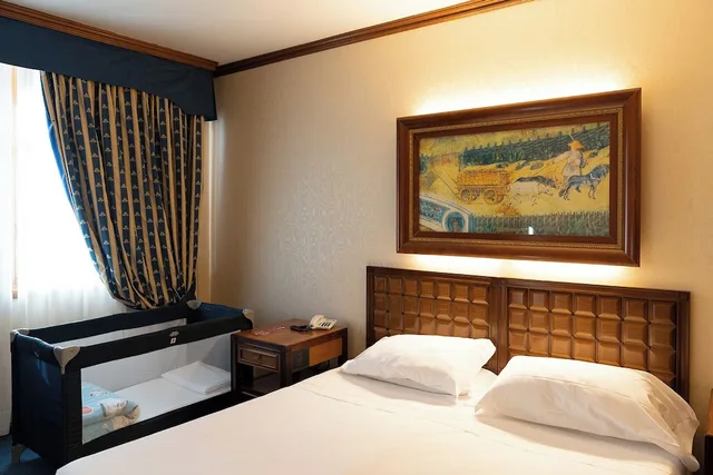 غرفة ديلوكس ثلاثية بسريرين منفصلين، GRAND HOTEL TRENTO 1/6