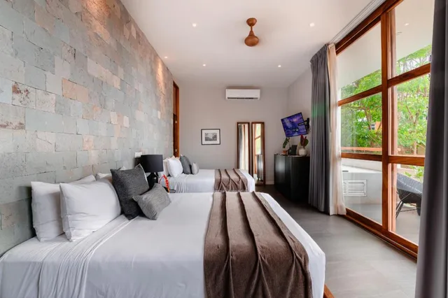 جناح بسريرين منفصلين، Agua de Luna Boutique Hotel 1/5
