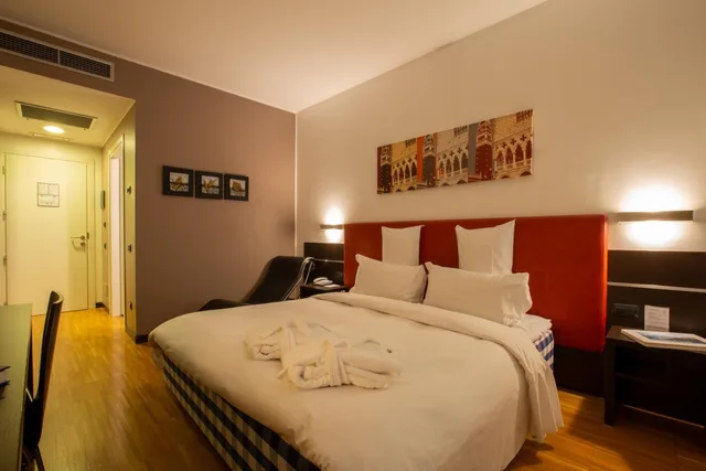 غرفة تنفيذية بسرير مزدوج أو سريرين منفصلين، Euro Hotel Residence 1/7