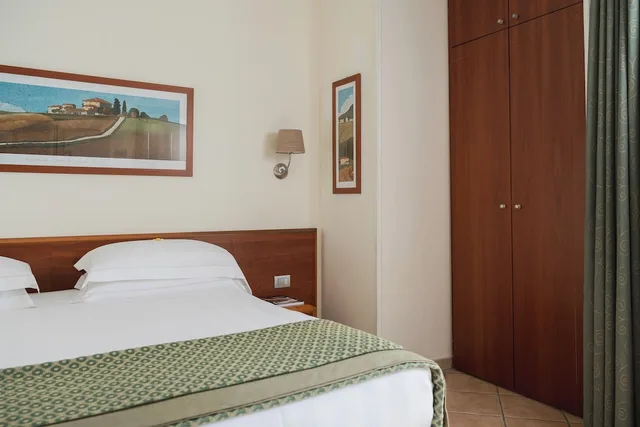 غرفة اقتصادية بسرير مزدوج أو سريرين منفصلين، Hotel Athena Siena 2/5