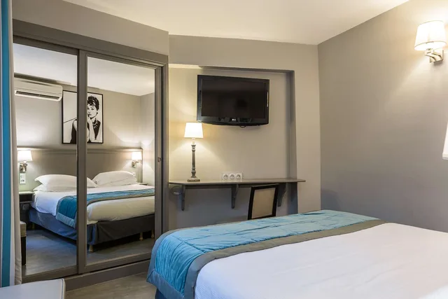 غرفة عائلية بسرير كوين وسريرين منفصلين، Hotel Montcalm 1/6