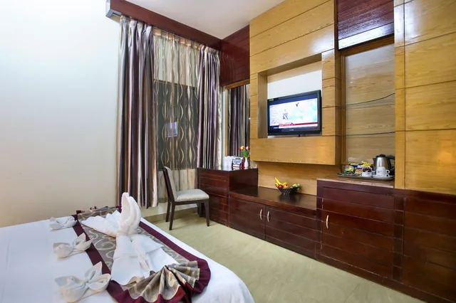 جناح عائلي ركني بسرير كينج وسرير فردي بغرفتي نوم، Fars Hotel and Resorts 2/4