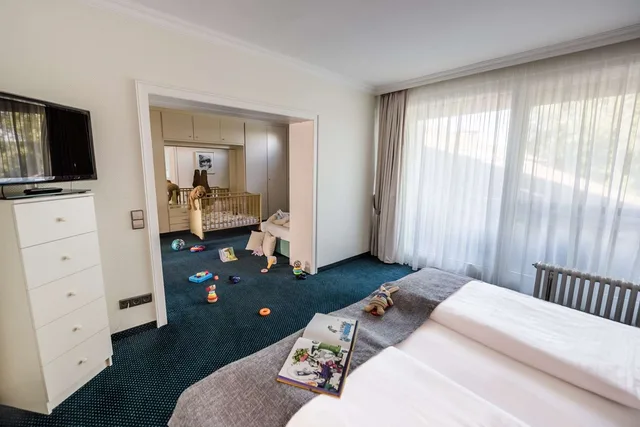 غرفة عائلية بسرير مزدوج بإطلالة على البحيرة، Best Western Premier Seehotel Krautkraemer 1/1