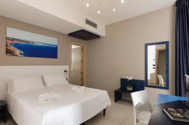 غرفة سوبيريور ثلاثية بسرير مزدوج وسرير فردي، Belvedere Torre Dell Orso Hotel 1/5