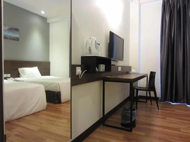 غرفة بريميير بسريرين منفصلين، Fuller Hotel 1/2