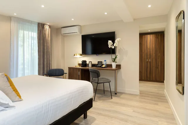 غرفة ديلوكس كبيرة بسرير كينج، Best Western Plus Hotel Brice Garden 7/9
