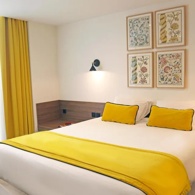 غرفة رباعية، TIMHOTEL LE LOUVRE 1/5