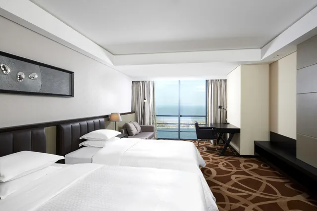استوديو جونيور بسرير كينج بإطلالة على البحر بغرفة نوم واحدة، Four Points By Sheraton Qingdao West Coast Formerly Four Points By Sheraton Qingdao Huangdao 1/6