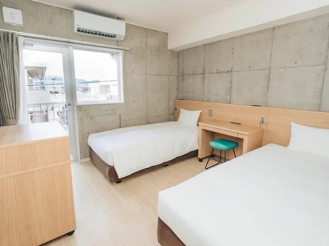 غرفة قياسية بسريرين منفصلين بغرفتي نوم، The Breakfast Hotel Marche Ishigakijima 2/7