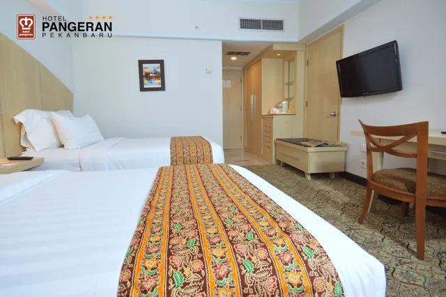 غرفة ديلوكس بسريرين منفصلين بغرفتي نوم، Hotel Pangeran Pekanbaru 6/7