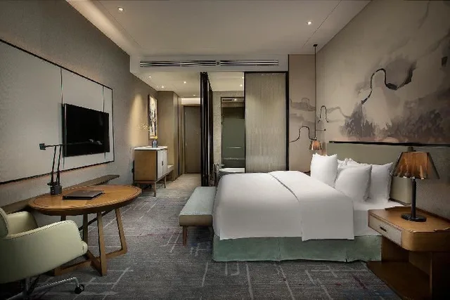 غرفة ديلوكس بسرير مزدوج بإطلالة على المدينة، Sunac Mauve Hill Hotel Guangzhou 1/2