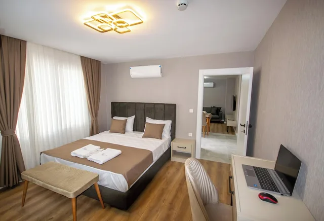 جناح عائلي ديلوكس بسريرين منفصلين مع أريكة، Luxury Life Suites 3/9