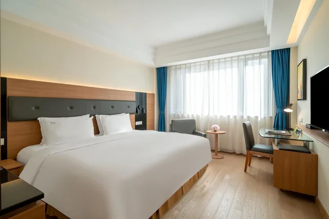 غرفة سوبيريور بسرير كينج، Holiday Inn Shanghai Hongqiao Central 3/9