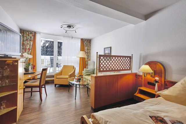 غرفة سوبيريور بسرير مزدوج بإطلالة على الحديقة بغرفة نوم واحدة مع أريكة، RUTERS PARKHOTEL 2/4