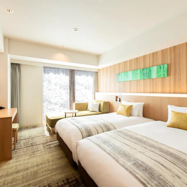 غرفة بسريرين منفصلين مع سرير إضافي، Hotel Grand Bach Sendai 1/4
