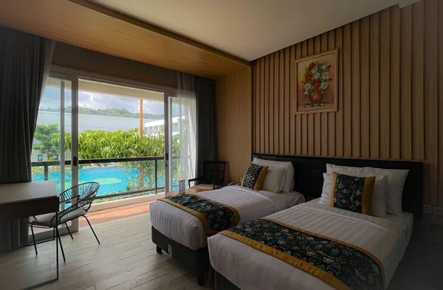 غرفة غراند ديلوكس بسريرين منفصلين، Raja Hotel Kuta Mandalika Resort & Convention 2/4