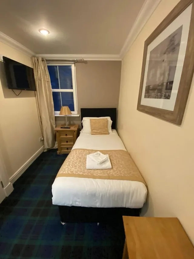 غرفة أساسية مفردة بسرير فردي بحمام مشترك، Waverley Guest House 1/1