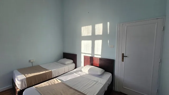 غرفة بسريرين منفصلين بحمام مشترك، Traveler Apos S House Hotel 4/10