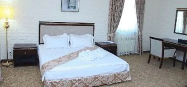 غرفة قياسية مفردة بسرير مزدوج، Grand Hotel Zarafshan 1/1