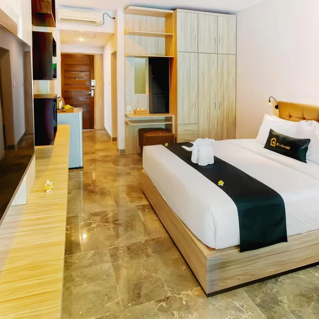 غرفة عائلية بشرفة، Graha Socio Hotel 4/8