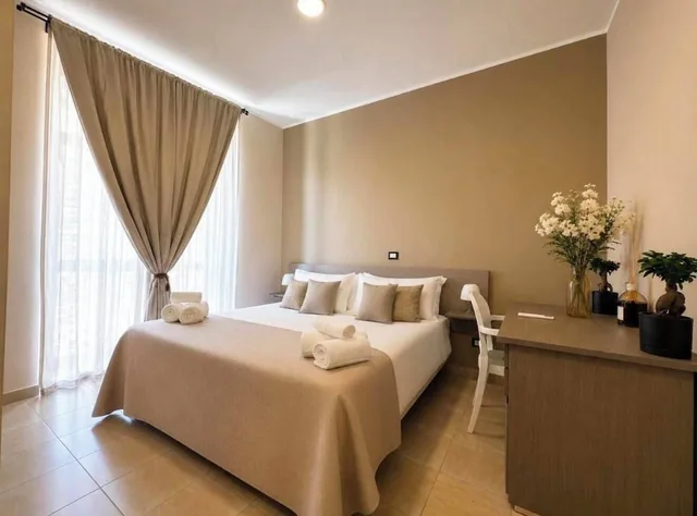 غرفة ديلوكس بسريرين كينج، Hotel Santuario Pompei 1/3
