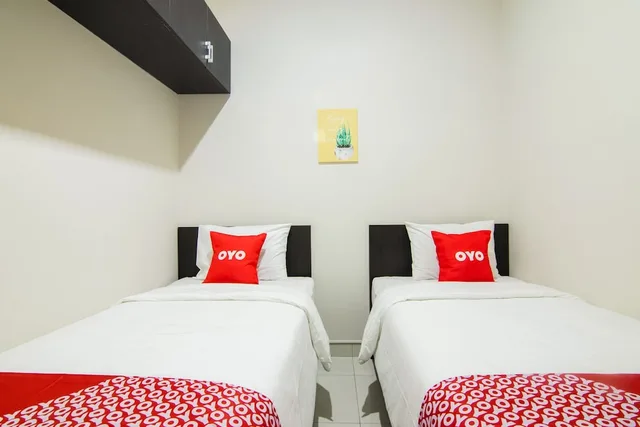 غرفة قياسية بسريرين منفصلين، OYO 3826 Columbus Residence K11 1/5